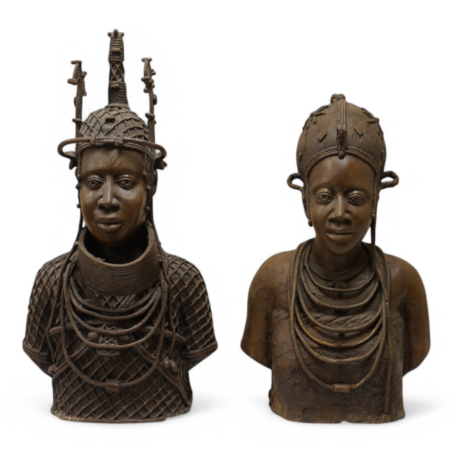 Two large Benin style bronze busts of African women, tallest 56cm. Condition - fair/good